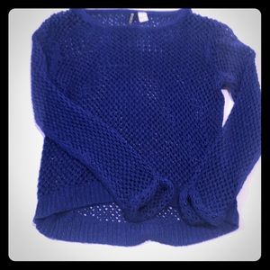 Blue crocheted sweater.